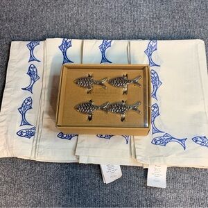 Pottery Barn Cream Napkins with Blue Fish Print and Silver Fish Napkin Rings